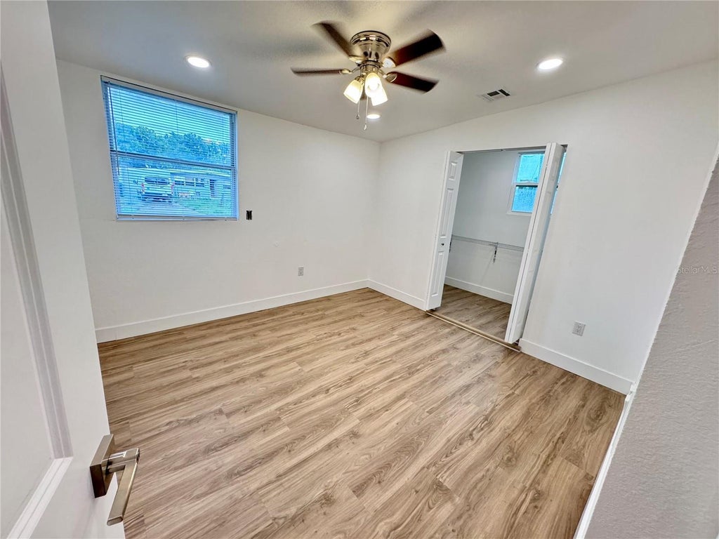 Photo of 7913 Tidewater Trail, Tampa, FL 33619 (MLS # O6433203)