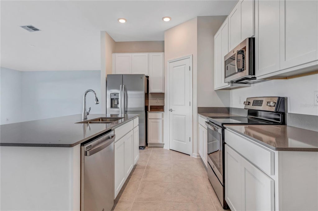 Photo of 865 Citrus Reserve Boulevard, Davenport, FL 33837 (MLS # O6443512)
