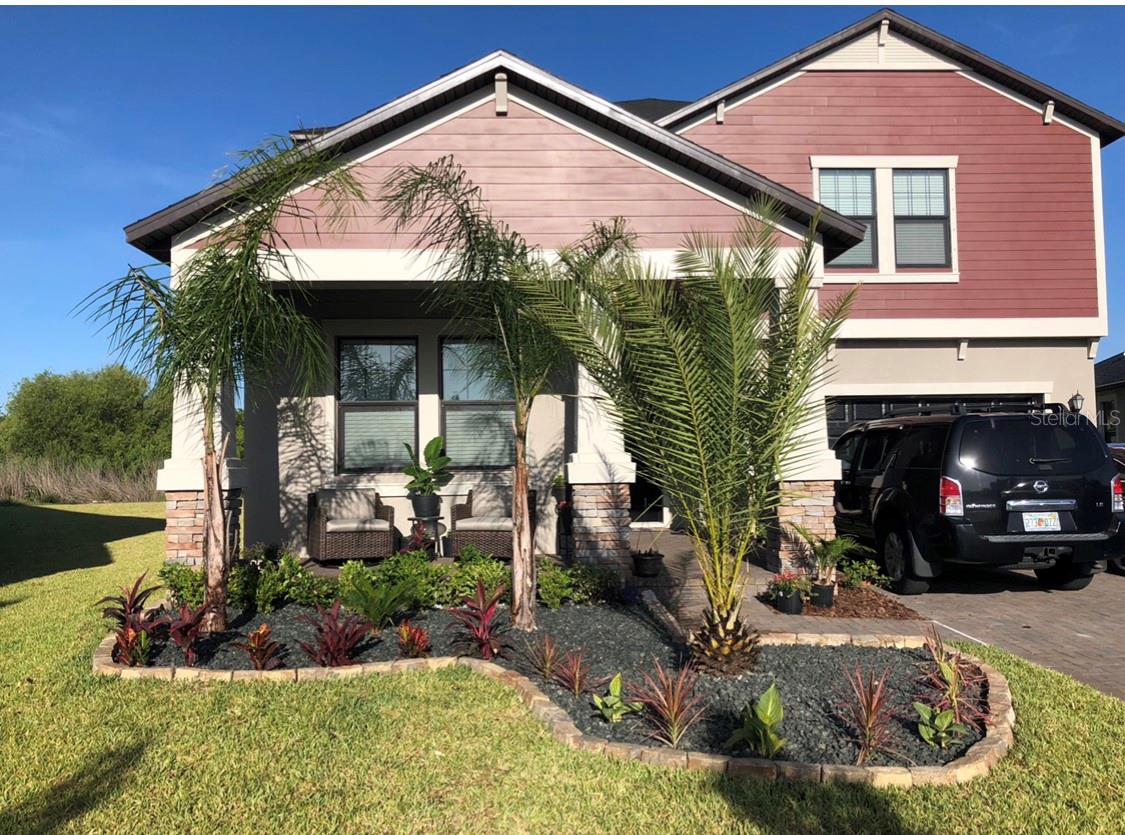 Wow here is your opportunity to rent this Executive large 5 bedroom 3 bathroom 3 car garage fenced yard home with a covered patio! Enjoy the beautiful fully upgraded kitchen with granite counters 42" wood cabinets with crown molding and a large kitchen island for entertaining guests. Tile floors throughout the common areas. Open floor-plan, freshly painted like brand new construction. Lawn Service included! Hurry before it's gone. PETS allowed with a NON Refundable Pet fee