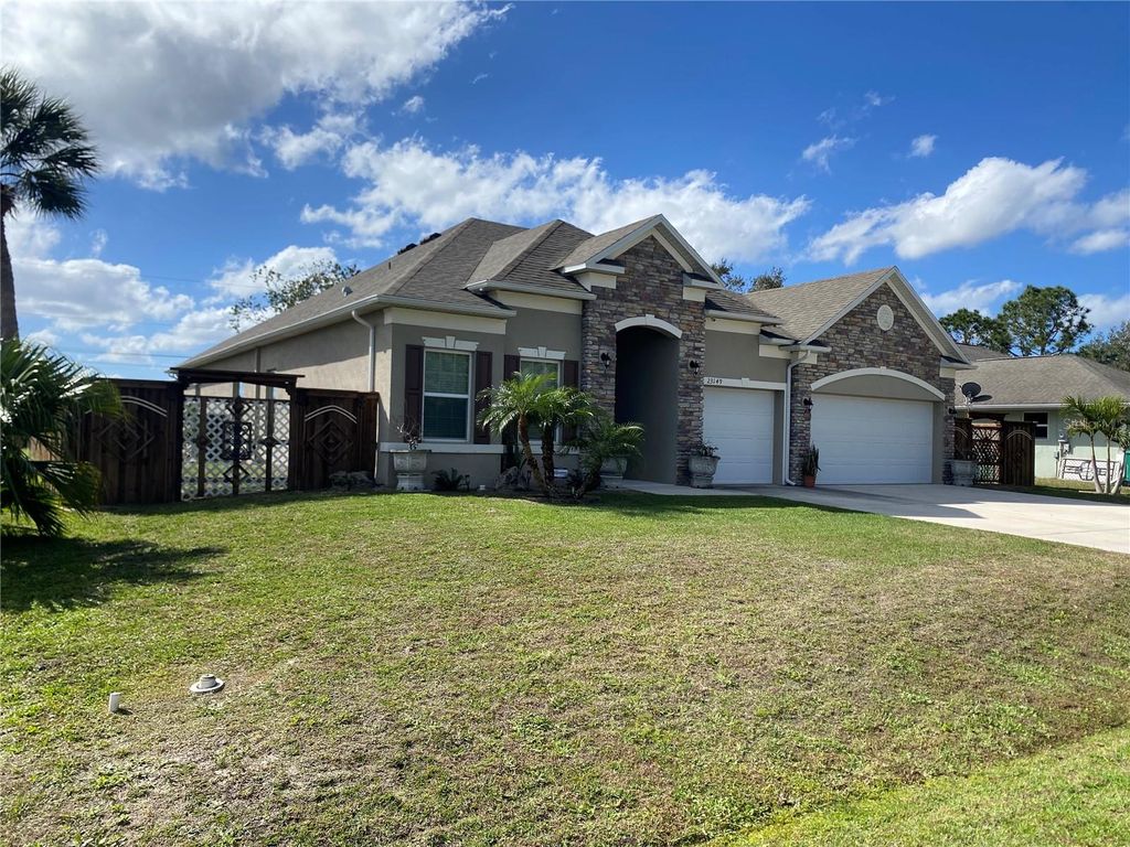 Photo of 23149 Hammond Avenue, Port Charlotte, FL 33954 (MLS # O6285753)