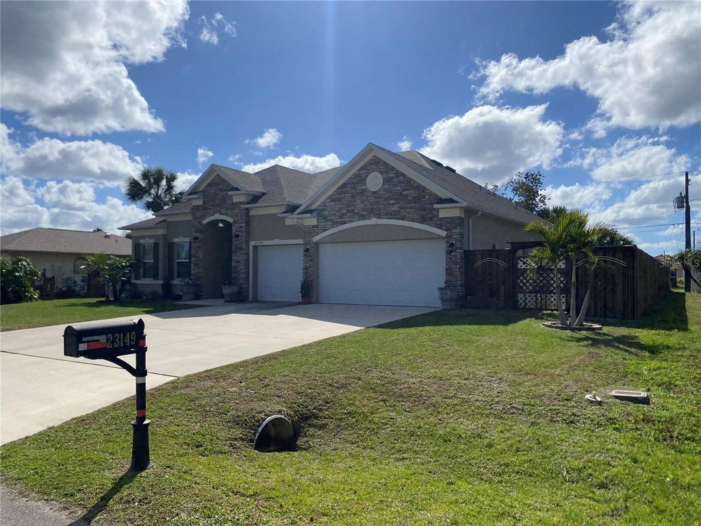 Photo of 23149 Hammond Avenue, Port Charlotte, FL 33954 (MLS # O6285753)