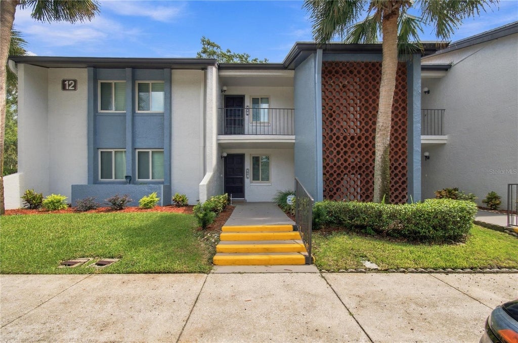 Photo of 12 Escondido Circle #114, Altamonte Springs, FL 32701 (MLS # O6449320)