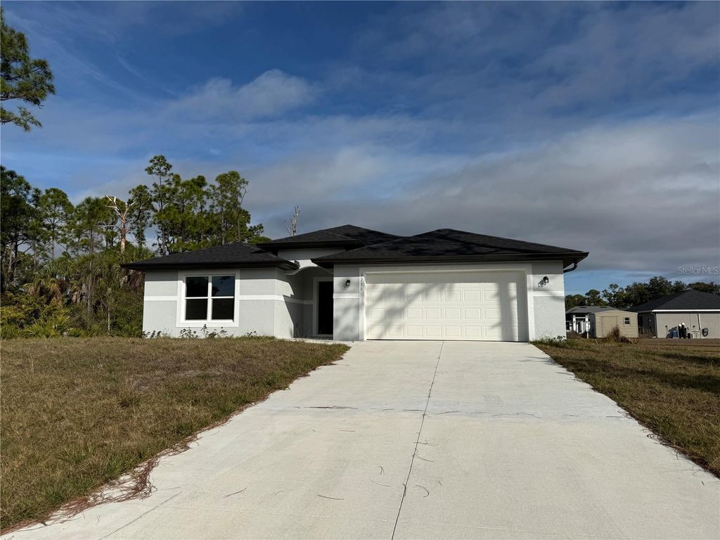 Photo of 3230 Worthington Avenue, North Port, FL 34286 (MLS # A4679614)