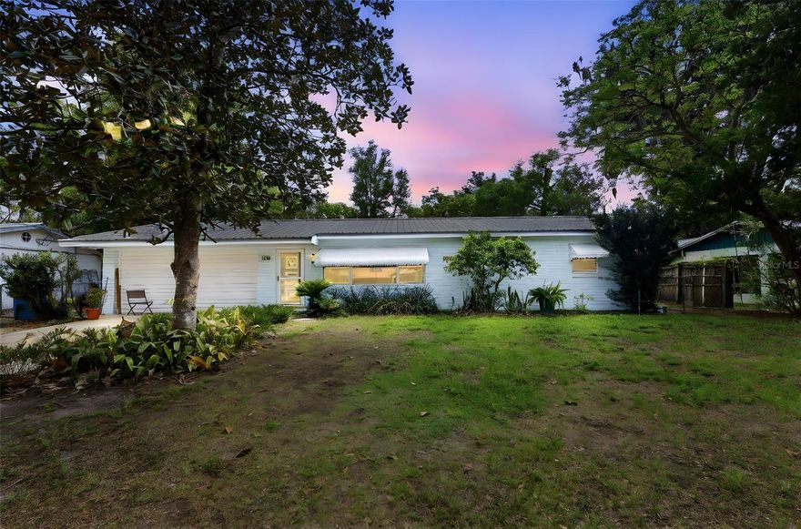 Home with plenty of room and good bones, ready for your touch.  Cement Block Home with Metal Roof, Original Parquet Wood Floors, Updated Kitchen and Baths.  2 Car Garage was converted to Primary Bedroom could be converted back to garage if desired.  Large Family Room is 11.5x23.8 with Wood Burning Brick Fireplace with French doors to the Screen Patio and access to the back yard.  The large back yard is fenced and has a utility shed for storage.  Great location close to Woodward Ave Elementary School.  Kitchen has Island and large Breakfast Bar, Formal Living Room could have many uses Formal Dining, Home office, etc.  New Septic Tank last year and Well for water.  City water is available if wanted.  No HOA Bills, No Water Bills, No Sewer Bills, very affordable living, great for a young family that needs plenty of room.