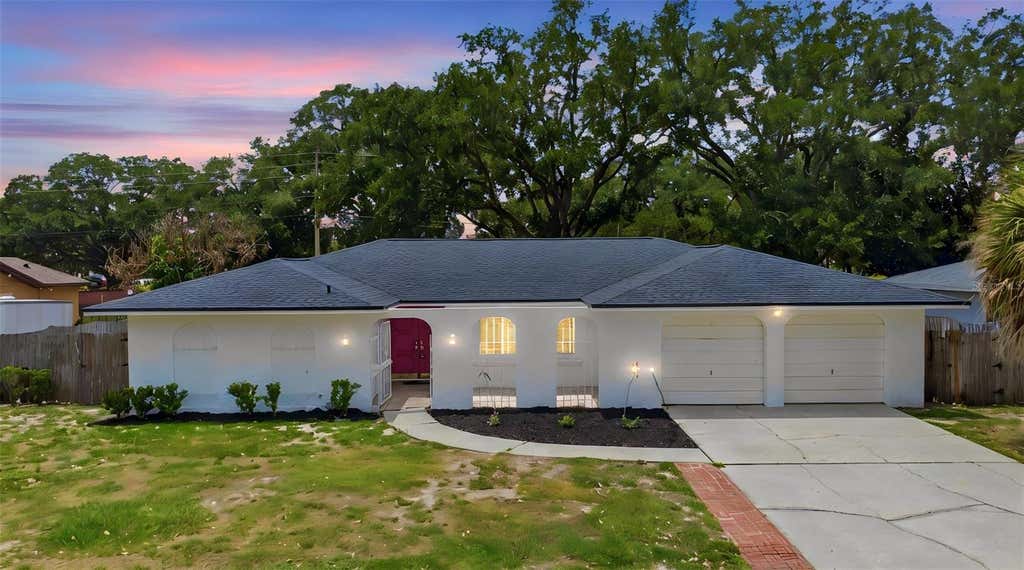 Photo of 6785 Tamarind Circle, Orlando, FL 32819 (MLS # O6430257)
