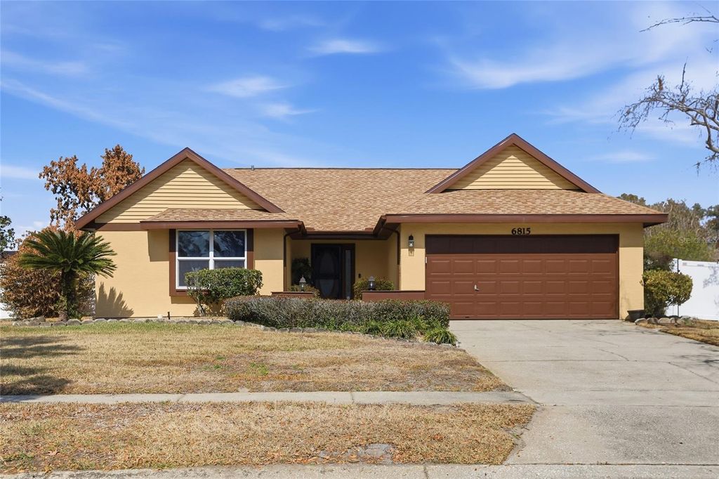 Photo of 6815 Merganser Drive, Orlando, FL 32810 (MLS # O6378667)