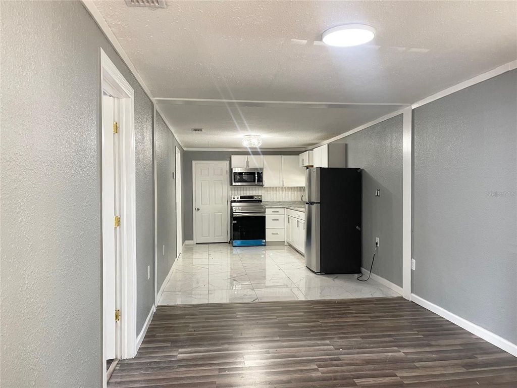 Photo of 630 N Nashua Avenue, Fort Meade, FL 33841 (MLS # O6374740)