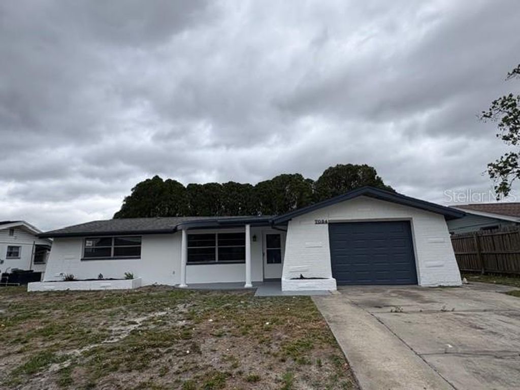 Photo of 7034 Coral Reef Drive, Port Richey, FL 34668 (MLS # TB8499260)