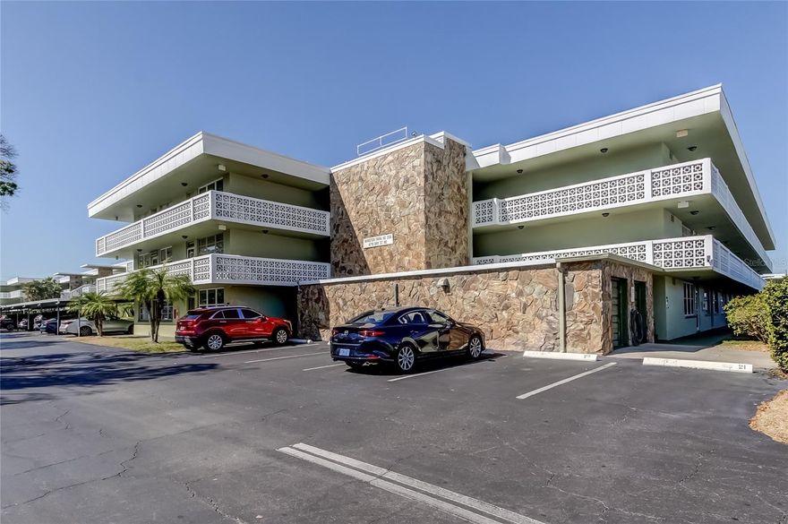 Charming and furnished, 2 bedroom, 1 bathroom condo in the heart of St Petersburg. This 55+ community has all the amenities you need. Featuring a pool for each building area, multiple pools to keep from overcrowding, a clubhouse, shuffleboard court, car wash area, laundry room on every floor, storage on every floor and an elevator. Come and see this unit. Light and bright with a North/South exposure. The spacious living area combines your living room and dining room with a ton of extra space. The kitchen features a breakfast bar and eat in space overlooking the pool area. The master bedroom has its very own walk in closet. While the 2nd bedroom has a beautiful built in closet system. Park your car in the assigned covered carport space. The unit has a good amount of storage space for all your extras.