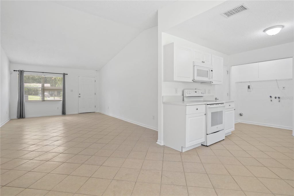 Photo of 1923 Bonneville Drive, Orlando, FL 32826 (MLS # O6429632)