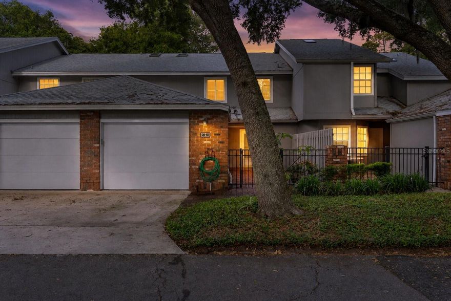 One or more photo(s) has been virtually staged. Welcome to this spacious 3-bedroom, 2.5-bath condo in the gated community of Oak Harbour. With nearly 2,000 sq ft of living space, this two-story home features a private brick-paver courtyard, granite countertops, solid wood cabinets, and stainless steel appliances in an eat-in kitchen. The home offers a bright and open layout with a large living and dining area, plantation shutters, crown molding, and upgraded bathrooms throughout. Upstairs, the primary suite includes a walk-in closet and updated bath, with two additional bedrooms offering ample space. Additional features include a one-car garage with WiFi-enabled opener, updated electrical panel, and included washer and dryer. Recent upgrades throughout the home provide added value and peace of mind. New windows were installed in 2022. Additional updates include a new water heater and all new bathroom fixtures in 2025. Fresh interior paint throughout the downstairs area recently finished as well. Oak Harbour residents enjoy a renovated clubhouse, fitness center, two pools, tennis and basketball courts, and private access to Lake Orienta with a boat ramp. Ideally located near I-4, shopping, hospitals, and dining, with easy access to Maitland, Winter Park, and downtown Orlando. Schedule a showing today.