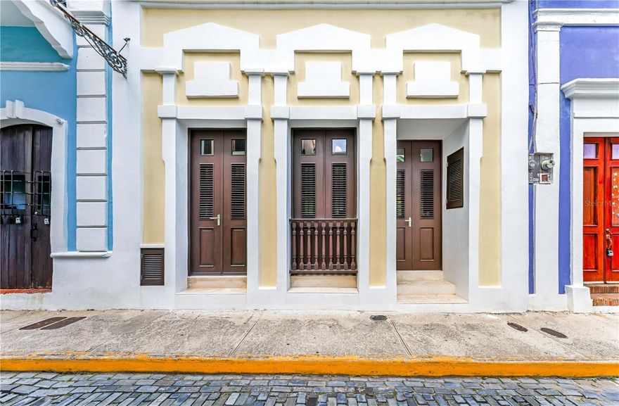 ***SOLD*** Situated in the heart of Old San Juan, this remarkable 6-bedroom, 6.5-bathroom residence seamlessly combines 18th-century charm with timeless elegance and modern comforts. Spanning approximately 4,074 Sq. Ft. of interior air conditioned space and an additional 1,914 Sq. Ft. of outdoor living, this palatial home with a private elevator offers an expansive 3-level layout designed for grand entertaining and a refined way of life. 275 Sol showcases tasteful living areas with an abundance of natural light throughout, in addition to a 83' 6'' x 22' 9'' rooftop terrace overlooking the old city with partial views of the bay and an indoor swimming pool on the ground floor. The first level also includes a guest bedroom with its own kitchen/living room and bath, allowing it to serve as a separate rental property to generate income as a rare investment opportunity. The main kitchen is located on the second floor, featuring top of the line appliances ready for your culinary endeavors. All of the bedrooms are ensuite and the primary includes a unique 2-level closet. This Spanish Colonial jewel with full tax exemption was recently restored to embody an enchanting lifestyle enriched by its storied history and architectural beauty. Old San Juan is the epicenter of Puerto Rican culture and is dotted with several UNESCO World Heritage Sites. It serves as one of the leading tourist destinations in the Caribbean and its celebrated buildings are renowned for their elegance and historic significance. The area is known for its numerous dining, shopping and nightlife options. Minutes away from Condado Beach and the Miramar Arts Districts. Walk along the cobblestone streets and experience the mesmerizing vibrancy of what we call El Viejo San Juan.