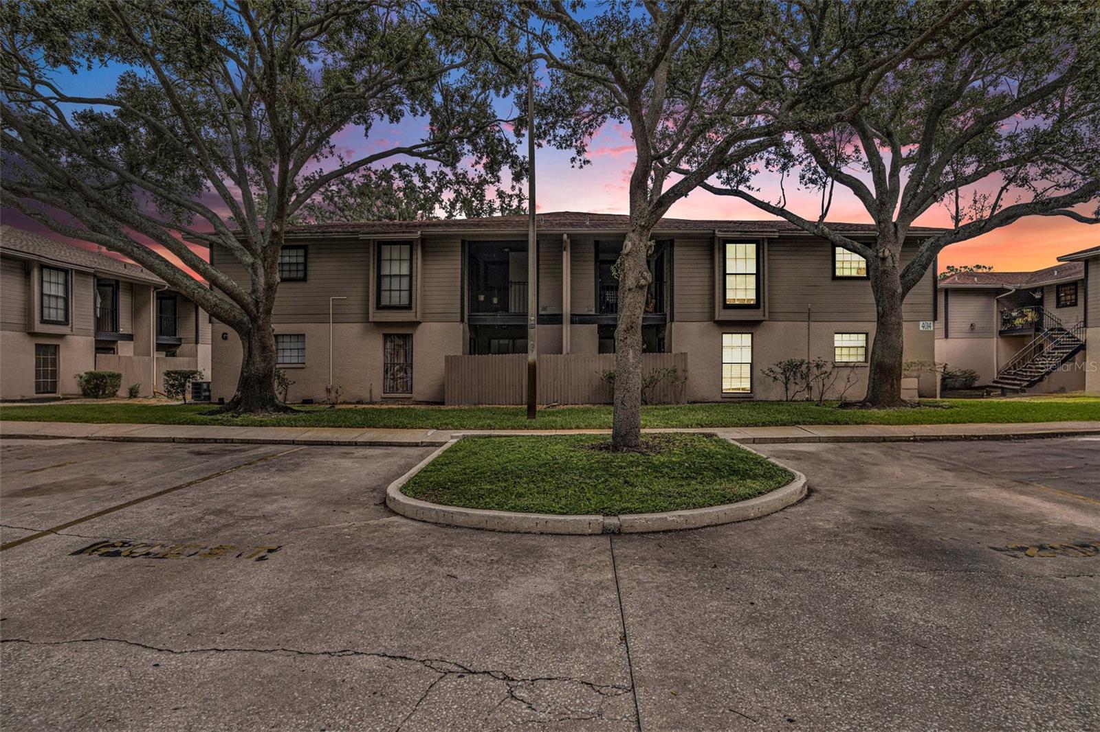 Welcome to this well-maintained 2-bedroom, 2-bath 1st floor condo offering a functional and open living space. The split-bedroom layout provides privacy, while the open-concept design connects the main living areas. Both bedrooms feature NEW carpeting and spacious closets. The unit also includes an in-unit washer and dryer for added convenience. Your covered patio offers a peaceful pond view. The unit offers 1 assigned parking space, but 2 cars are allowed and there is ample open parking. There's plenty of guest parking, and the location offers easy access to I-75 and I-275. Best of all, this condo is less than a 1/2mi. to the University of Florida, as well as many great dining/entertainment options and activities for outdoor enthusiasts. A perfect blend of comfort, convenience, and low-maintenance living.