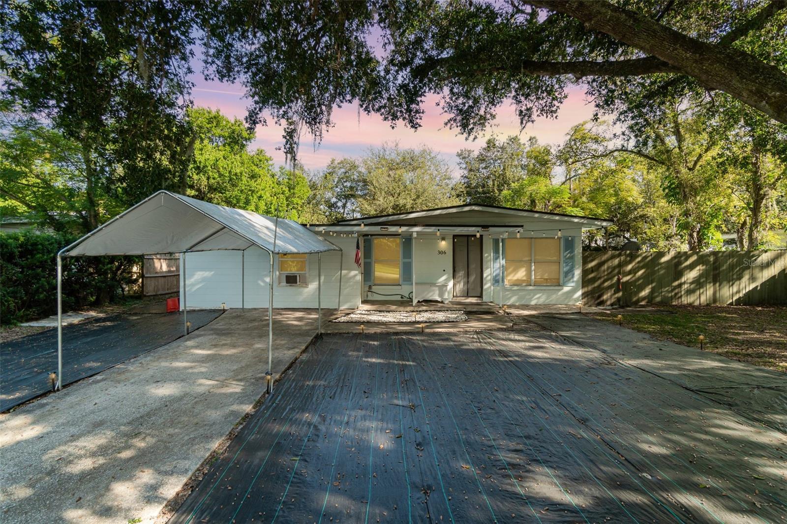 No HOA. Newer roof (2021). Home has been completely repiped. Large front and back yard with low-maintenance ground covering (no grass to mow). Property includes an additional detached studio with private entrance that may be used as guest accommodations or flex space. Conveniently located near shopping, dining, and major roadways.