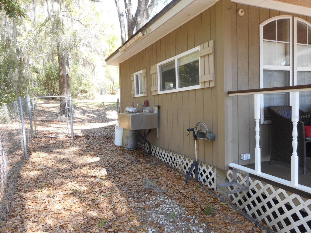 Photo of 880 SW Shorewood Drive, Dunnellon, FL 34431 (MLS # OM721265)