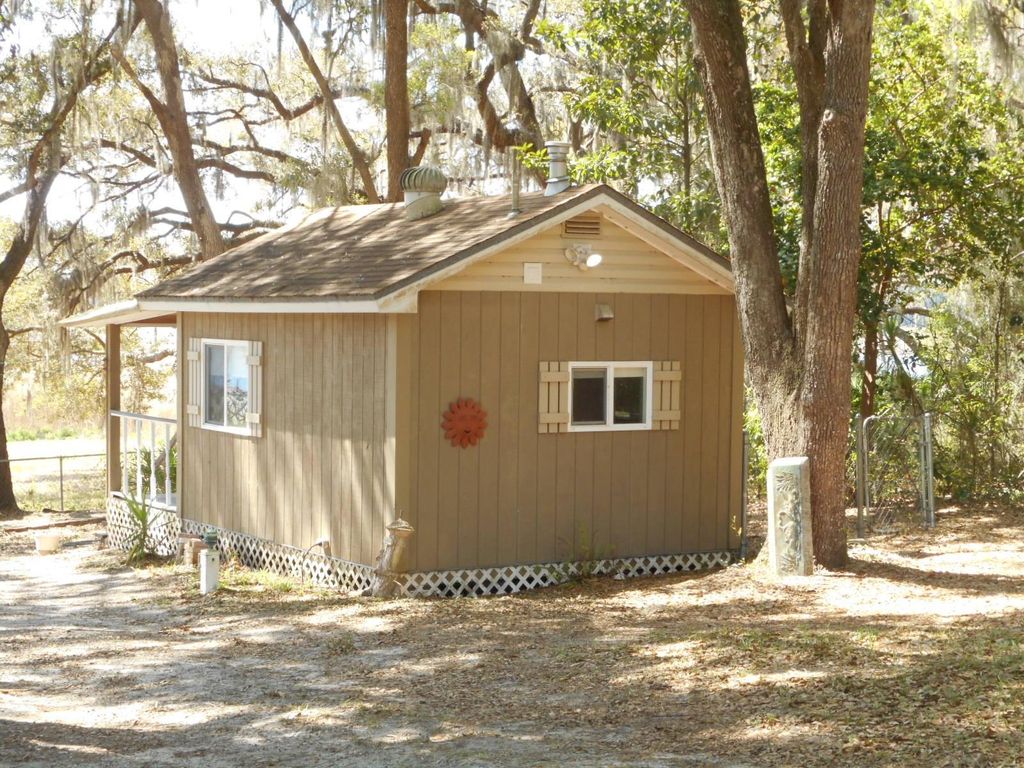 Photo of 880 SW Shorewood Drive, Dunnellon, FL 34431 (MLS # OM721265)