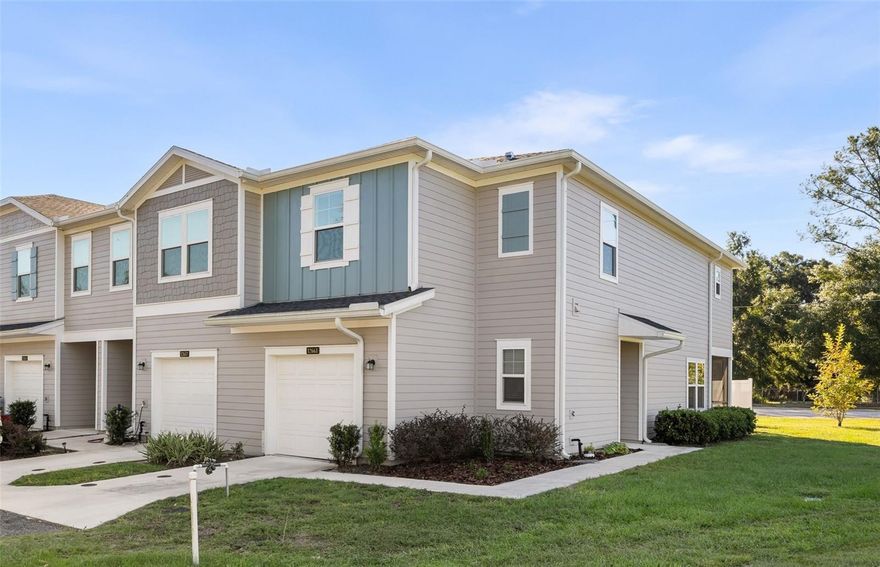 ***Seller offering $2500 credit to the Buyers with agreeable offer. Welcome to convenient luxury living! This nearly new, two-story end unit townhome in the highly sought-after Tara West End community offers the perfect blend of style, space, and location. Step inside the first level to find an open-concept design that connects the gathering room, kitchen, and nook, all featuring elegant and durable wood look tile throughout. The multifunctional U-shaped kitchen is a chef's delight, boasting stainless-steel appliances, a large single-basin sink, and beautiful quartz countertops. Enjoy Florida evenings and convenient indoor-outdoor entertaining on the screened lanai. Upstairs, the second floor hosts all three bedrooms and a versatile loft. Retreat to the spacious master suite, complete with a luxurious master bath featuring dual vanity sinks and a walk-in shower. Bedrooms 2 and 3 share a convenient Jack-and-Jill bathroom. The loft space is perfect as a study, media center, or secondary seating area. Location, Location, Location! You couldn't ask for a better spot—this community is situated directly across the street from the vibrant Tioga Town Center, putting dining, shopping, and entertainment within easy walking distance. Tara West End provides a community of new, maintenance-free townhomes, simplifying your lifestyle. Designed for every family type and living situation, this specific end unit offers extra light and privacy. Don't miss the chance to own this fantastic home!