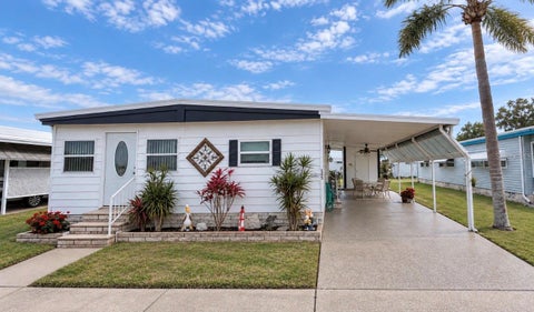 Photo of 1100 Belcher Road S #665, Largo, FL 33771 (MLS # TB8559666)
