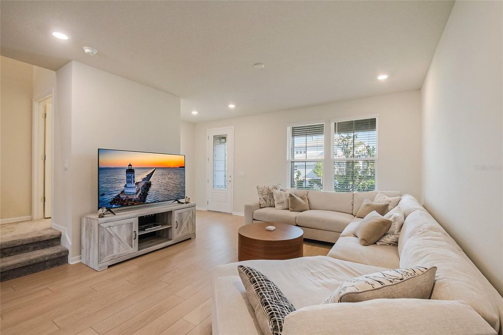 Photo of 6938 Reverie Park Avenue, Orlando, FL 32829 (MLS # O6427216)