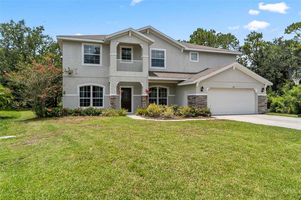 Photo of 227 Birchwood Drive, Palm Coast, FL 32137 (MLS # FC320881)