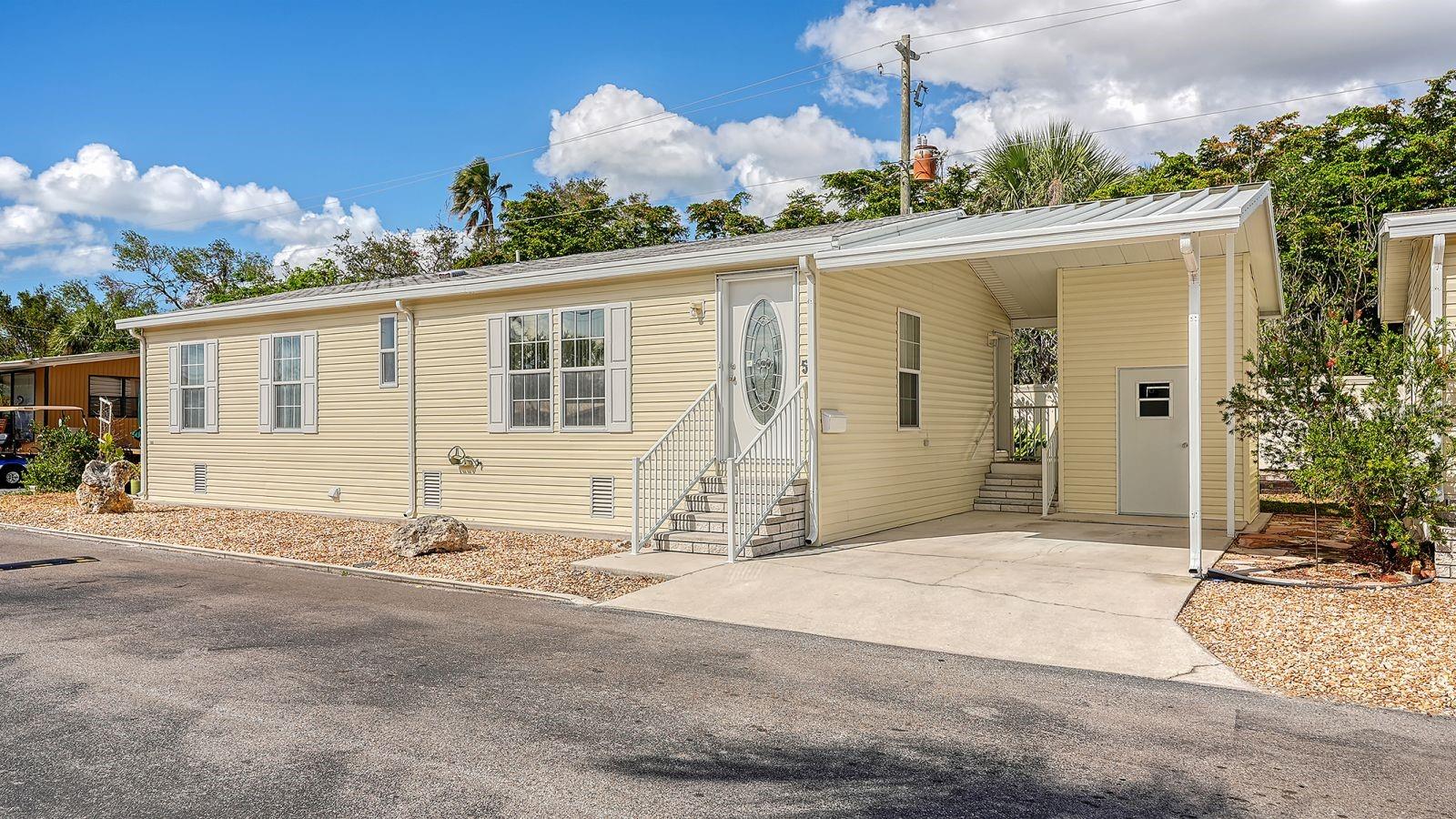 Co-op OPPORTUNITY in sought after Southwinds MHP! This beautiful double-wide is absolutely immaculate and waiting for you! Open Plan with a Great Room, Spacious Kitchen with an Island/Breakfast Bar & Dining Area. Interior Laundry Closet with a Washer and Dryer. 2 Bedrooms and 2 Full Bathrooms and 1,056 square feet of living space (1,344 Gross square feet). This is a 55+ Community that is friendly and allows you to enjoy the Florida living at it's BEST! Community Amenities include a heated community pool, shuffleboard, horseshoe pits, library, recreation hall, guest parking and designated spaces for RV's & boats. South Winds MHP Co-op is resident owned (rare & hard to find)! Carefree & maintenance-free lifestyle is the best & most affordable around in South Sarasota, let alone the convenient location in sought after, quiet South Sarasota! Minutes to world famous Siesta Key Beaches, Fine Dining, & within 15 minutes to cultural downtown. This beautiful double-wide was custom built in '2005. Being Sold As Is with the right to inspect. Application to be completed and must be approved by the HOA (stop by office to obtain). The price includes "1 Share" in this co-op. Fees include: Cable TV*Heated Community Pool*Lawn Maintenance*Water & Sewer. The location of this one is perfect and is easy to get in & out of the community! Covered carport & a storage shed are added bonuses. H-U-R-R-Y on this golden opportunity to live in this beautiful double-wide in this fabulous and well managed mobile home park that is manicured beautifully! Manager on Site. Make it yours today; EZ Show!