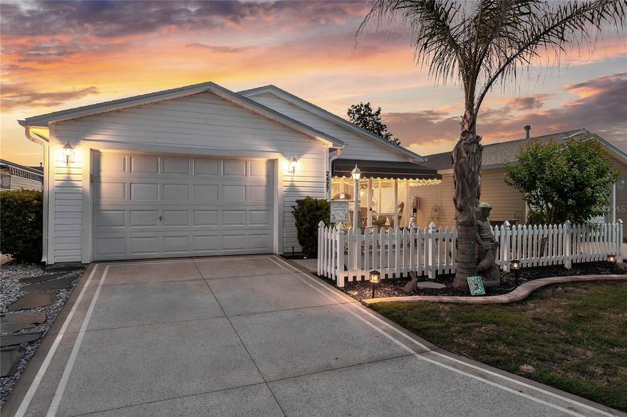 Welcome to 2427 Southern Oak Street in the highly sought-after community of  Lynnhaven in The Villages, Florida! This beautifully maintained 2-bedroom, 2-bath patio villa offers comfort, style, and exceptional outdoor living. The villa is close to shopping, dining, banks, convenience stores as well as Publix and Walmart. Numerous golf courses and pools in the area with Arnold Palmer Golf and Country Club just a short golf cart drive away.

From the moment you arrive, you’ll notice the painted driveway which extends to the front and side patio, all designed for easy maintenance and added curb appeal. Driveway expansion to allow for easier access to move your car or cart in and out of the garage. The garage is a one car garage with room for a golf cart! Awnings on the front and side provide shade and charm, while front gutters add functionality. The front yard features brand-new sod installed in 2025, enhancing the home’s fresh and inviting appearance.

Step inside to find a thoughtfully updated recently painted interior with granite countertops in the kitchen, complemented by stainless steel appliances that are only two months old and a brand-new garbage disposal. The home features plantation shutters throughout, crown molding in every room, new ceiling fans with integrated light kits with remotes for easy use along with comfort and style.

The living area boasts durable and attractive LVP flooring, while the kitchen and baths are finished with linoleum for easy care. You have a large breakfast bar but you also have plenty of room for an eat-in kitchen area.There is a pantry for storage along with plenty of cabinets. Enjoy cooking with a gas stove and stay comfortable year-round with gas heat. Dining area is large enough for a table that seats 6-8 guests for family gatherings or entertaining friends.

Main bedroom has a walk-in closet with ample space. The bathroom has a single vanity with shower and glass doors. There is a linen closet in the hallway near the guest bathroom which has a shower tub combination, single vanity and additional cabinet. The guest bedroom has plenty of room for a complete bedroom set with a built-in closet.

Relax in the screened-in front porch with tile flooring and convenient pull-down shades—perfect for enjoying Florida’s beautiful weather. Additional upgrades include plantation shutters in every window, solar tube in kitchen for extra lighting, newer slider doors (installed 4 years ago) with built-in blinds, as well as built-in blinds in the front entry door for added privacy and convenience. 

Major systems include a 2020 roof, HVAC from 2005, and a water heater approximately 5 years old. The washer and dryer are located in the garage, and the home is equipped with a Ring doorbell and a rear motion light on the back left corner of the home for extra security.

A low bond balance of approximately $2,500. The villa is in excellent condition and is truly move-in ready. Don’t miss your opportunity to own a well-cared-for villa with fantastic upgrades and outdoor living spaces in one of Florida’s premier 55+ communities!