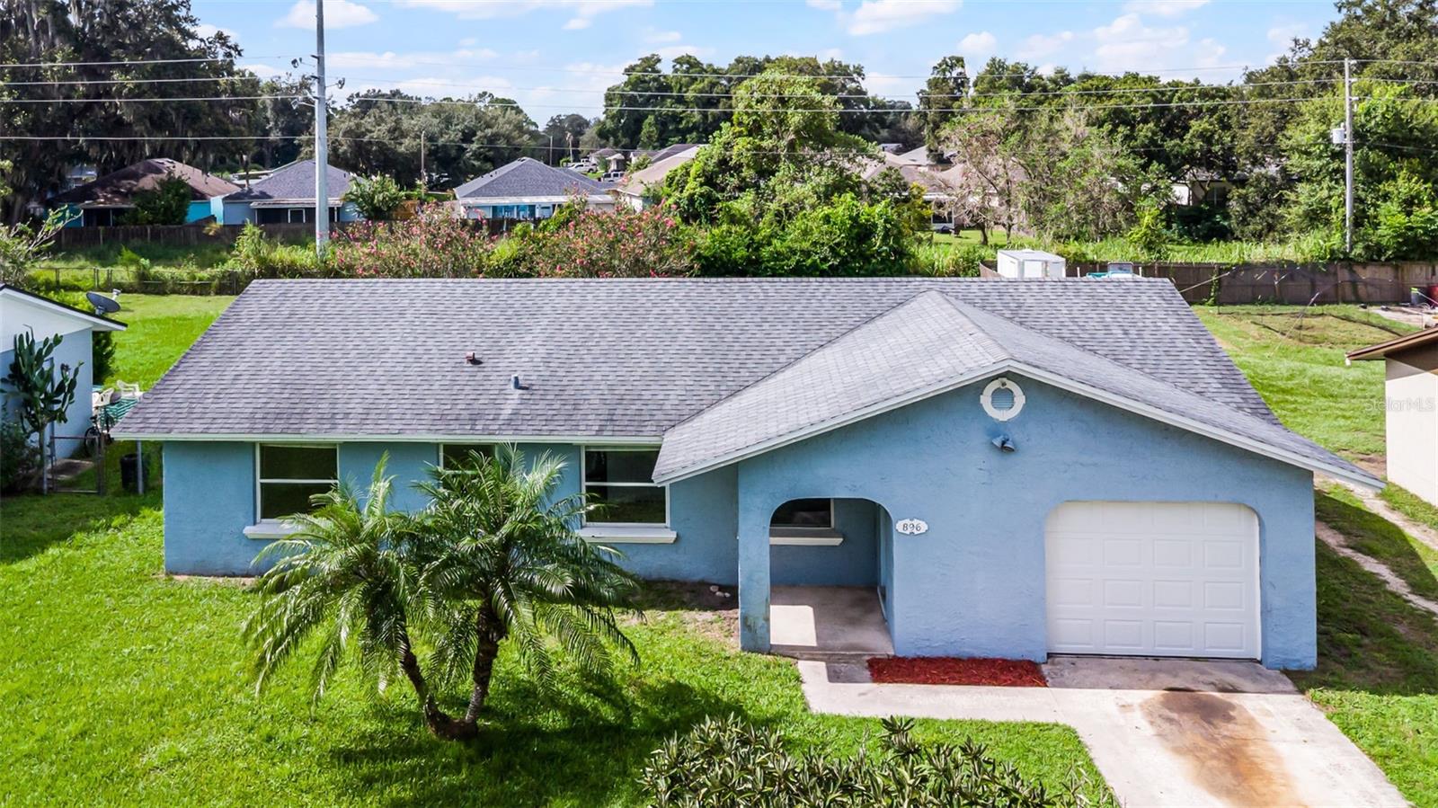 One or more photo(s) has been virtually staged. Charming 4-Bedroom, 2-Bathroom Home with Spacious Backyard in Oviedo – No HOA
and a $3,000 Appliance Concession! This beautifully maintained home boasts 4 spacious
bedrooms and 2 bathrooms, offering the perfect blend of comfort and functionality within
walking distance of Oviedo High School. Key updates include a newer roof (2020), new A/C
(2025) and new water heater (2025) for added peace of mind. As you step inside, you'll
immediately be greeted by an inviting, open-concept living and dining area, perfect for
entertaining or relaxing. The kitchen sits conveniently to the right of the dining area, while a
hallway to the left leads to the private bedroom wing, providing excellent separation of
space. Enjoy brand-new carpeting (2025) in all the bedrooms, offering a fresh and cozy
feel. The main living areas feature stunning gloss marble-like tile, adding a touch of
elegance and easy maintenance. The expansive backyard is perfect for outdoor
gatherings, gardening, or simply enjoying Florida's sunny weather. Plus, you'll love the
large screened-in back patio, offering a fantastic spot to unwind. Best of all? There is NO
HOA, giving you added freedom and flexibility. Located in the desirable city of Oviedo, this
home is just minutes away from schools, parks, shopping, and dining options.
Don’t miss out on this wonderful opportunity – schedule your showing today!