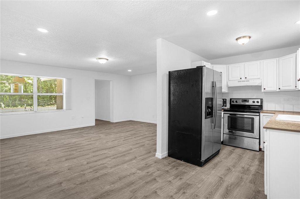 Photo of 516 Pitt Street, Wildwood, FL 34785 (MLS # O6398385)