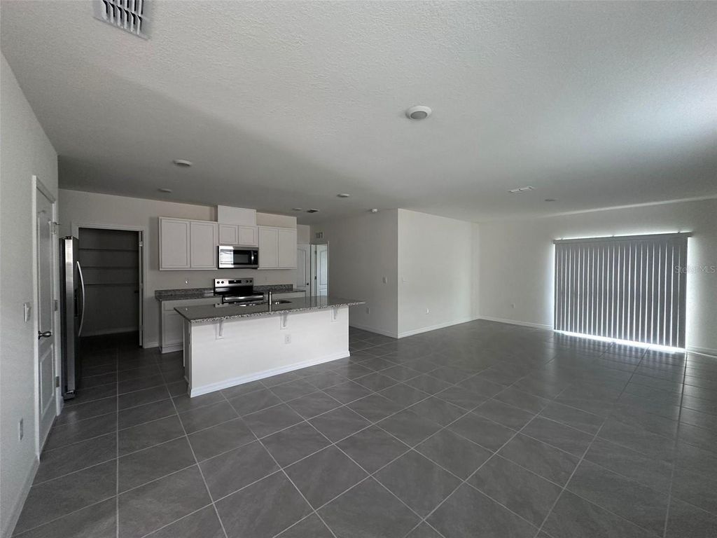 Photo of 3635 Fort Mellon Lb Ln, Sanford, FL 32773 (MLS # O6357100)