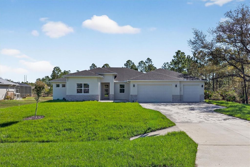Photo of 3133 Cavalier Avenue, Orlando, FL 32833 (MLS # O6390070)