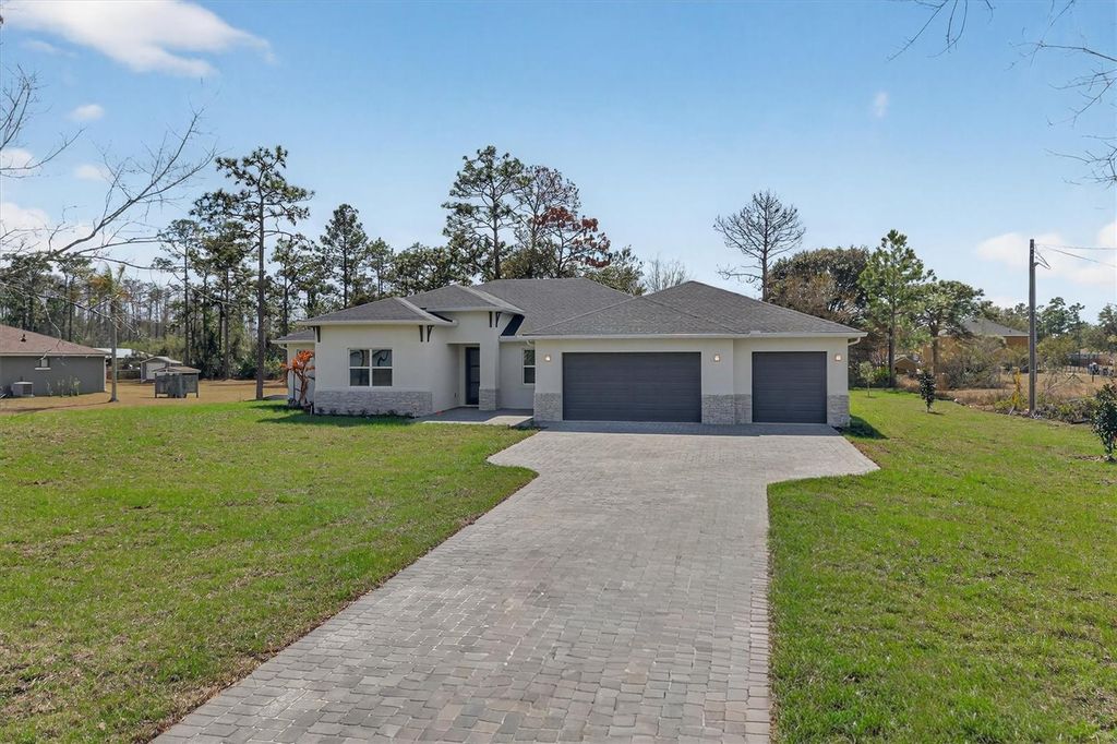 Photo of 3133 Cavalier Avenue, Orlando, FL 32833 (MLS # O6390070)