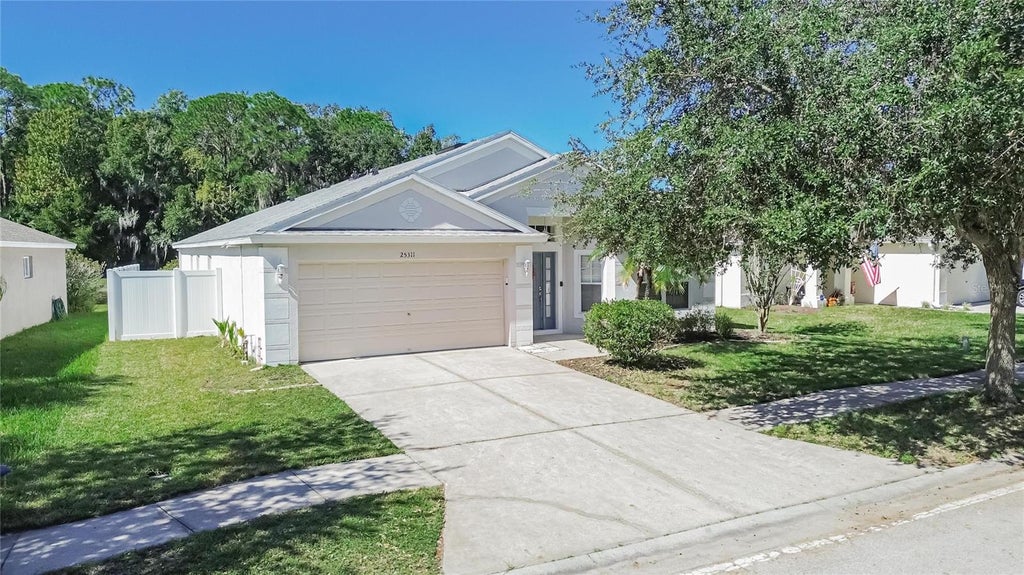 Photo of 25311 Lexington Oaks Boulevard, Wesley Chapel, FL 33544 (MLS # TB8559531)