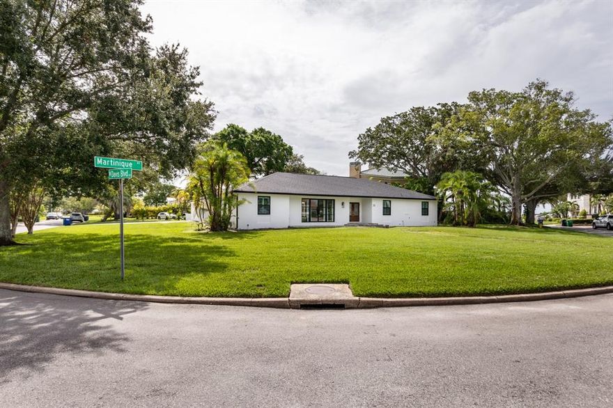 For those looking for an incredible opportunity to own a beautiful home and a large piece of land on highly desirable Davis Islands, look no further than 71 Martinique Ave. This striking single family home sits on a massive corner lot (.37 acres) and has been remodeled down to the studs. The impeccable craftsmanship and quality of all interior finishes were done by Homeworks Design and DI home. The modern home includes a large saltwater sports pool with all new equipment, high ceilings, gas fireplace, top of the line water filtration system, tankless water heater, wiring for 8 security cameras and Sonos speakers throughout the main living areas of the home and by the pool. Meticulous attention to detail is presented in the kitchen with new quartz countertops, quartz waterfall on the oversized island, new custom cabinets and Sub Zero and Thermador appliances. Adjacent to the living room, there’s an open family room leading to beautiful steel and glass French doors which accesses the front porch. In addition, there are tray ceilings and custom cabinets throughout the house, large glass sliders between living room and pool that fully open for an indoor/outdoor experience and a room off of the pool with a full bath. This beautiful home has a new roof (2021) and more exterior work in progress and scheduled for completion in September. A wonderful home just a short distance away from Davis Islands village with many restaurants, shops, and bars. Bring your golf cart and enjoy the Island lifestyle with walking/biking paths, baseball fields, public tennis courts, public historic pool, two dog parks, a beach, public marina, and an airport. Located only minutes from Downtown Tampa, Water Street's Sparkman Wharf, and the Tampa Riverwalk, makes this neighborhood the most desired in South Tampa.