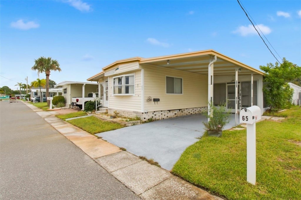 Photo of 65 Schooner Drive #65, Palm Harbor, FL 34683 (MLS # TB8555805)
