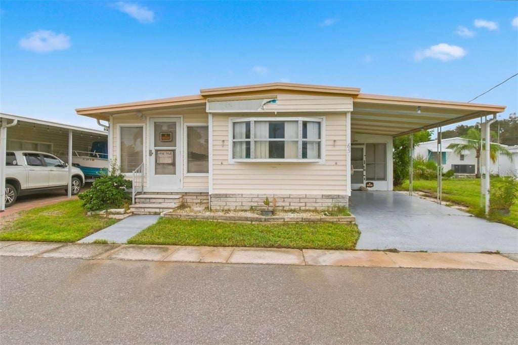 Photo of 65 Schooner Drive #65, Palm Harbor, FL 34683 (MLS # TB8555805)