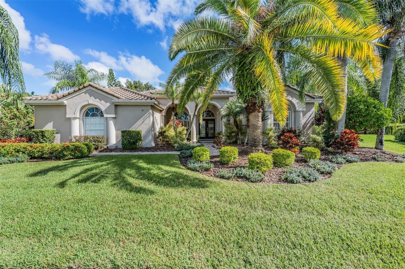 Welcome to an exquisite opportunity within the gated community of Harbor Links. This luxurious executive estate, situated on a meticulously landscaped 0.399-acre lot, offers a blend of elegance, comfort, and modern sophistication. Boasting 4 bedrooms, 3 bathrooms, and a 3-car garage, this pool home stands as a testament to refined living in one of the area’s most desirable neighborhoods. Step inside this light-filled, spacious residence to discover meticulous attention to detail throughout. The thoughtfully designed split floor plan ensures privacy and convenience, featuring an oversized master suite that serves as a serene retreat. Three additional bedrooms, plus a dedicated office space, provide ample accommodation, each enjoying access to fully renovated bathrooms. At the heart of the home lies the beautifully renovated kitchen, equipped with 42” wood cabinets, sleek granite countertops, and top-tier GE Café appliances. Culinary enthusiasts will appreciate the gas double oven, gas range, and modern refrigerator. The master bath offers spa-like luxury, complete with wood cabinetry, granite counters, a frameless glass shower, and premium fixtures. Additional interior upgrades include matching granite countertops, updated flooring, plantation shutters, remote-controlled family room shades, and new wood cabinets in the laundry and family rooms. A fireplace with a new wood mantle and remote-controlled gas logs, alongside new ceiling fans, 5 ¼ inch baseboards, and all-new paint, contribute to the home's fresh and modern aesthetic. The home also features updated outlets, light fixtures, fans, recessed lighting, switches, bathroom fans, and smoke detectors, ensuring safety and modern comfort throughout. The estate's exterior is as breathtaking as its interior, featuring a newer tile roof (2017) and a recently added impact-rated double front door (2024) that enhance both security and curb appeal. Freshly painted with upgraded exterior lighting, the property also boasts enhanced landscaping, lighting, and irrigation systems, all remotely controlled. The backyard transforms into a private oasis featuring a new fence, a screened pool lanai, and a newly sealed brick paver walkway and pool deck. The pavers have been expertly sealed, ensuring long-lasting beauty and durability. The saltwater pool area has been meticulously revitalized, including a Marquis finish and pool tile (2017). The garage is upgraded with durable polyespartic flooring. Experience resort-style living with access to two community pools featuring a spiral waterslide, basketball and tennis courts, pickleball courts, athletic fields, and three playgrounds. Located within a top-rated school district, this home promises an unparalleled lifestyle in Westchase, recently named the best suburb in Florida by Niche Inc. Enjoy nearby golf courses, dining, shopping, and easy access to major highways, the airport, downtown Tampa, and the stunning beaches of Clearwater and St. Pete. This luxurious Harbor Links estate offers the perfect blend of elegance, modern amenities, and an unbeatable location. Don’t miss the chance to own this exceptional home!
