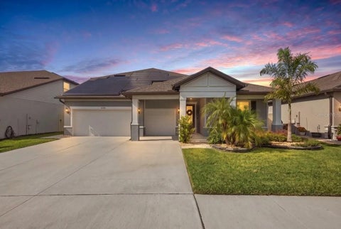Photo of 9442 Ibis Grove Boulevard, Wesley Chapel, FL 33545 (MLS # TB8545117)