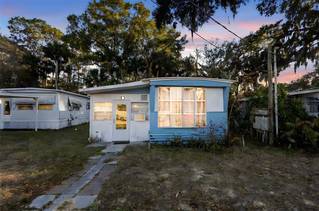 Photo of 1910 Enterprise Ave #13, New Smyrna Beach, FL 32168 (MLS # O6382977)