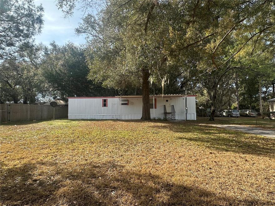 Come see the quiet and charming proeprty in Summerfield. Plenty of space in the the fenced front & back yards. A/C is two months old. 

This single-wide manufactured home sits on beautiful timbered and. The layout is a nice split floor plan. Summerfield offers convenient access to the Villages & Ocala.
