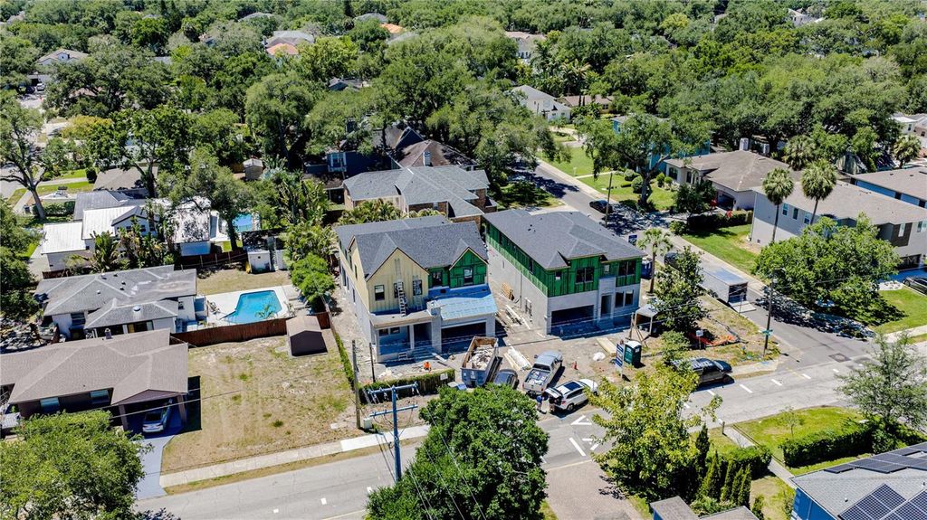 Photo of 4020 W Cleveland St, Tampa, FL 33611 (MLS # TB8462881)