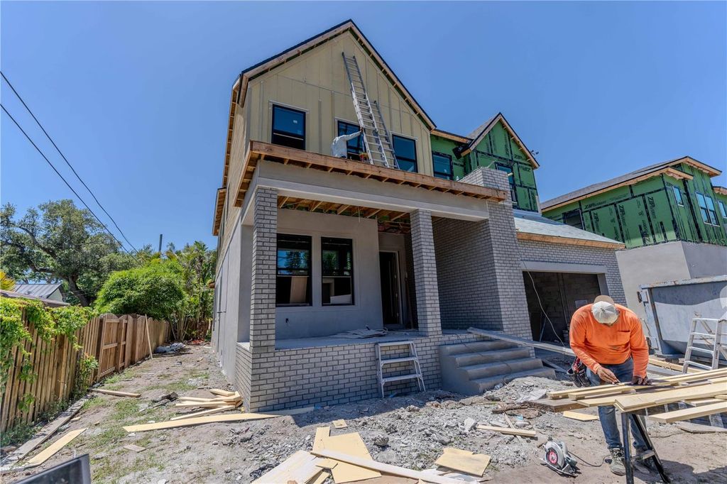 Photo of 4020 W Cleveland St, Tampa, FL 33611 (MLS # TB8462881)