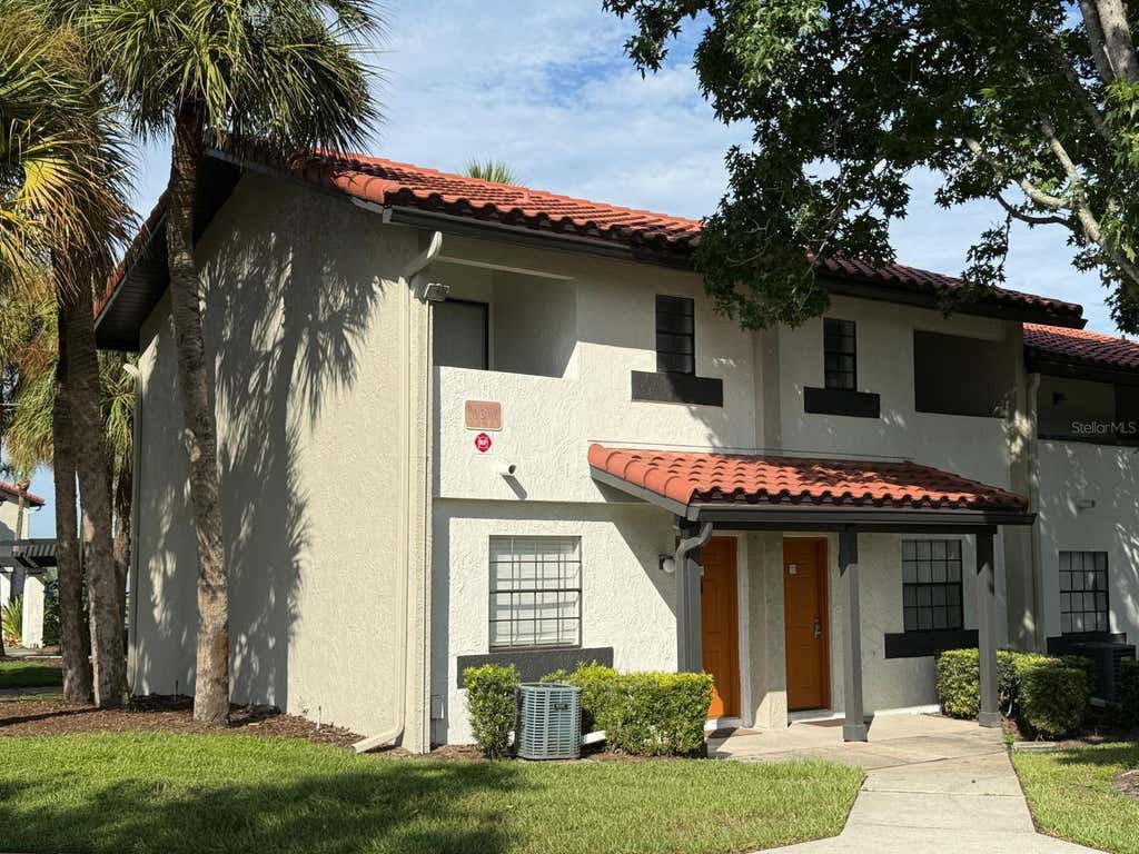 Photo of 10316 Turkey Lake Road #111 (A-07), Orlando, FL 32819 (MLS # O6430761)