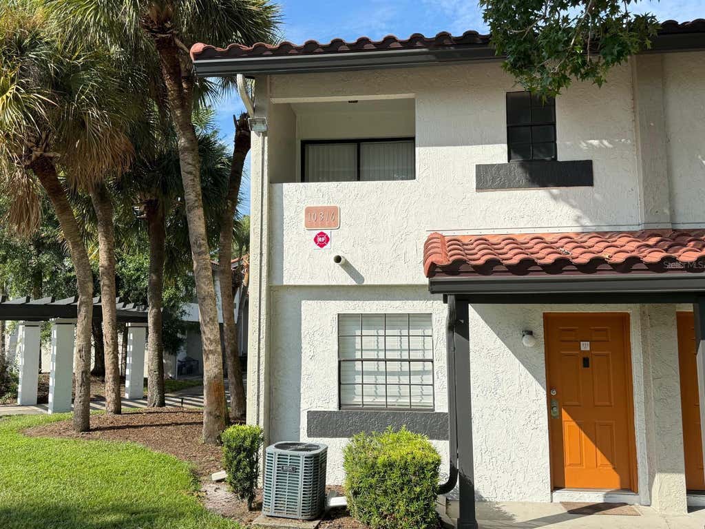 Photo of 10316 Turkey Lake Road #111 (A-07), Orlando, FL 32819 (MLS # O6430761)