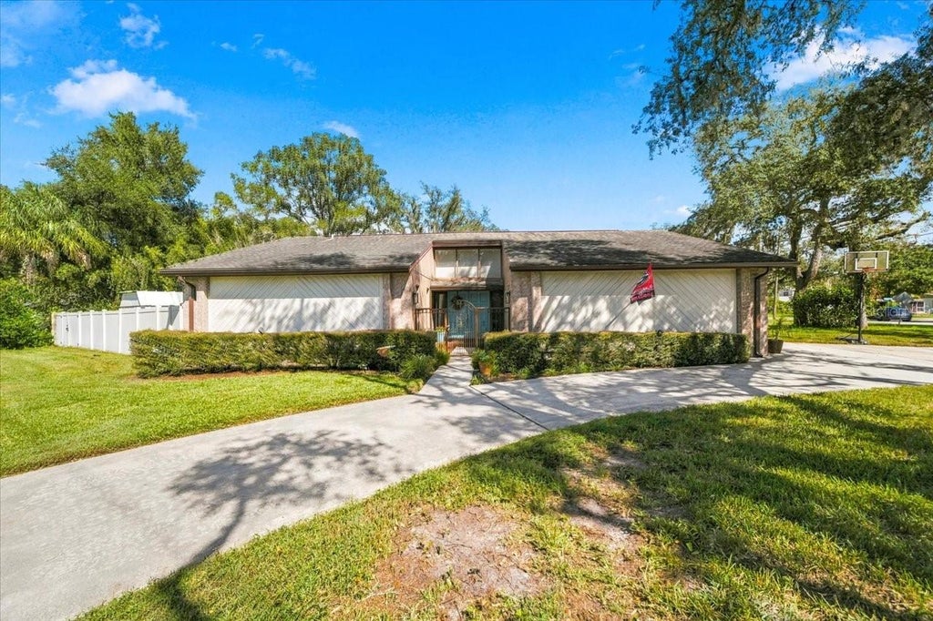 Photo of 2231 S Village Avenue, Tampa, FL 33612 (MLS # TB8556257)