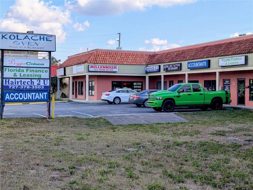 Highly Visible Small-Shop Retail in West Pasco
Now leasing four affordable retail/service bays on busy State Road 52 in Hudson!
This freestanding multi-tenant building offers excellent exposure, an ID monument sign, and direct frontage on one of West Pasco’s main commercial corridors.
Perfect for local service businesses, boutique retail, professional office, specialty shops, salon/barber, wellness, vape/smoke, tax/insurance, resale, and neighborhood-oriented tenants.
________________________________________
?? Property Highlights
• Freestanding multi-tenant retail building
• Total building: 4,694 SF (plus 573 SF covered canopy)
• Excellent exposure on SR-52 with ID sign
• 6 total units — 2 leased, 4 available
• Individual electric & water meters for every unit
• Each unit has a rear door + access to canopy area
• Extra parking on the side of the building
• Strong visibility for drive-by traffic
• Ideal for small service businesses and value-focused tenants