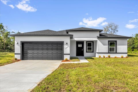 Photo of 15684 SW 37th Circle, Ocala, FL 34473 (MLS # O6453551)