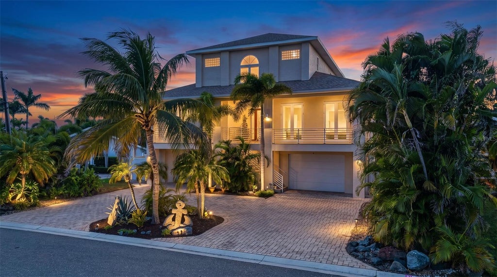 Photo of 532 Johns Pass Avenue, Madeira Beach, FL 33708 (MLS # TB8561081)