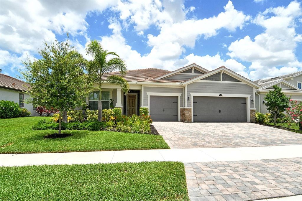 Photo of 8668 Sundance Loop, Sarasota, FL 34238 (MLS # A4655747)