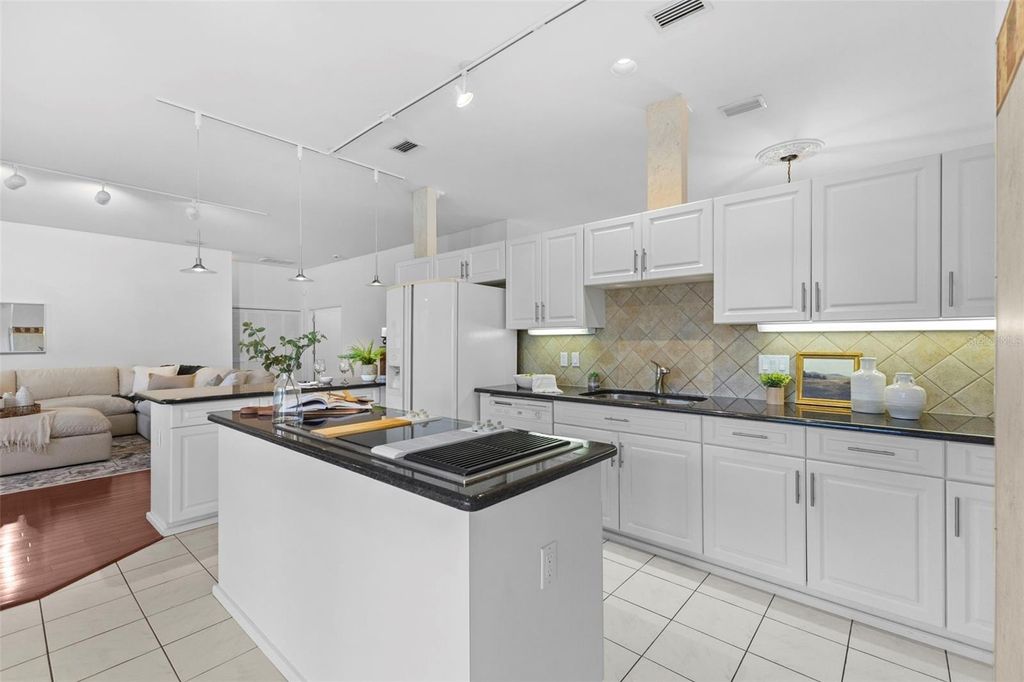 Photo of 642 Weathersfield Drive, Dunedin, FL 34698 (MLS # TB8438649)