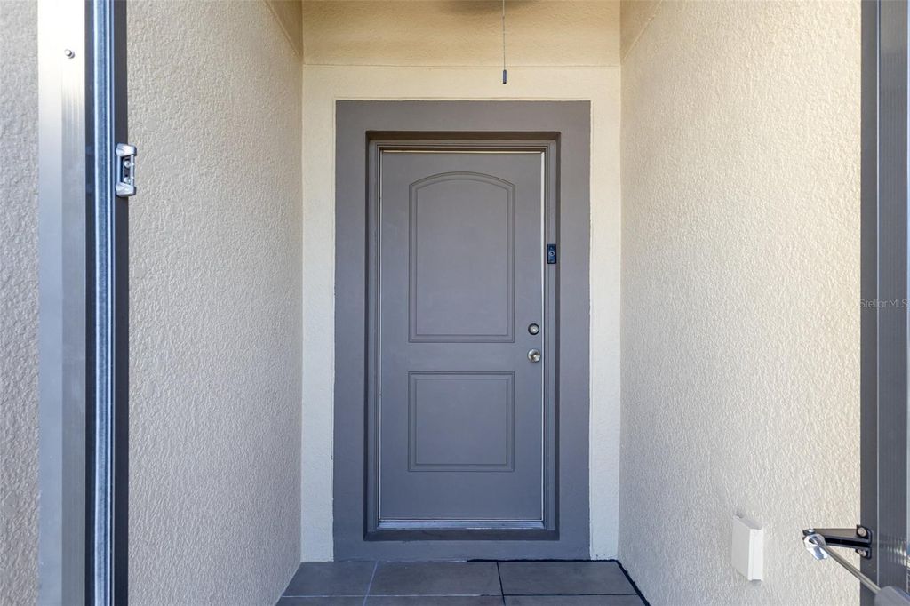Photo of 104 Jasmine Circle, Kissimmee, FL 34759 (MLS # O6345441)
